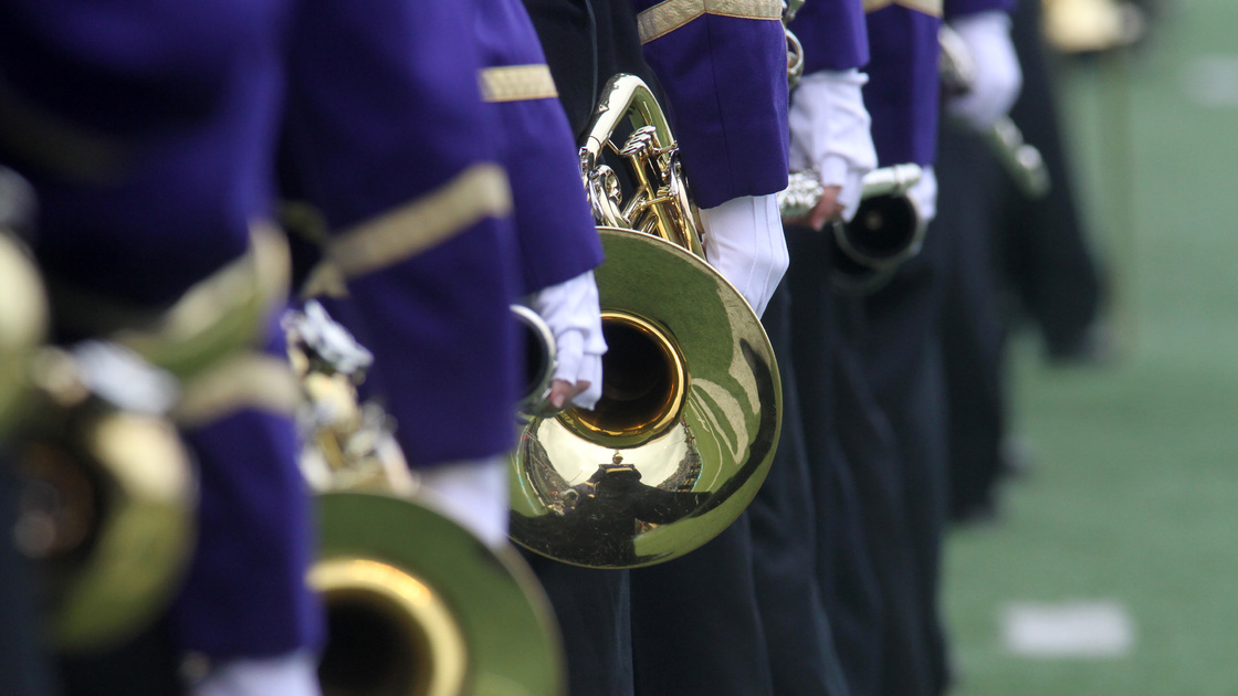 Marching band musicians performing.