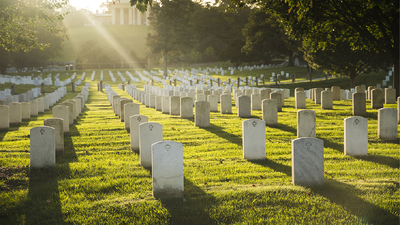 Rays of light bathe the resting place of American heroes at Arlington National Cemetery