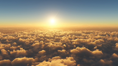 high angle view of beautiful golden sunset above clouds