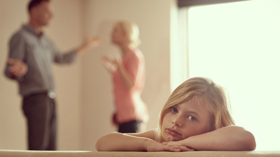 A little girl looking at the camera