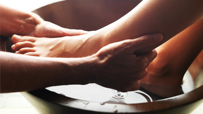 Woman feet receiving a foot massage at the spa