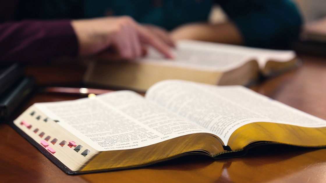 Young couple studying the Word of God together