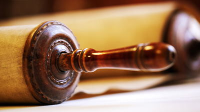 Old torah scroll book close up detail. Torah Jewish People. Shallow depth of field