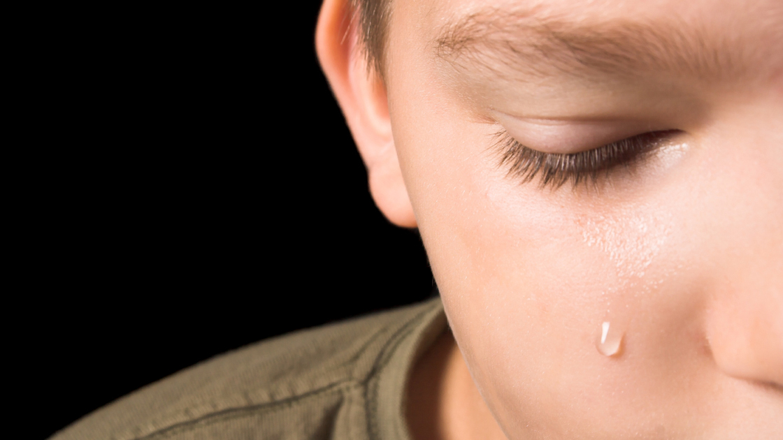 Blonde boy crying