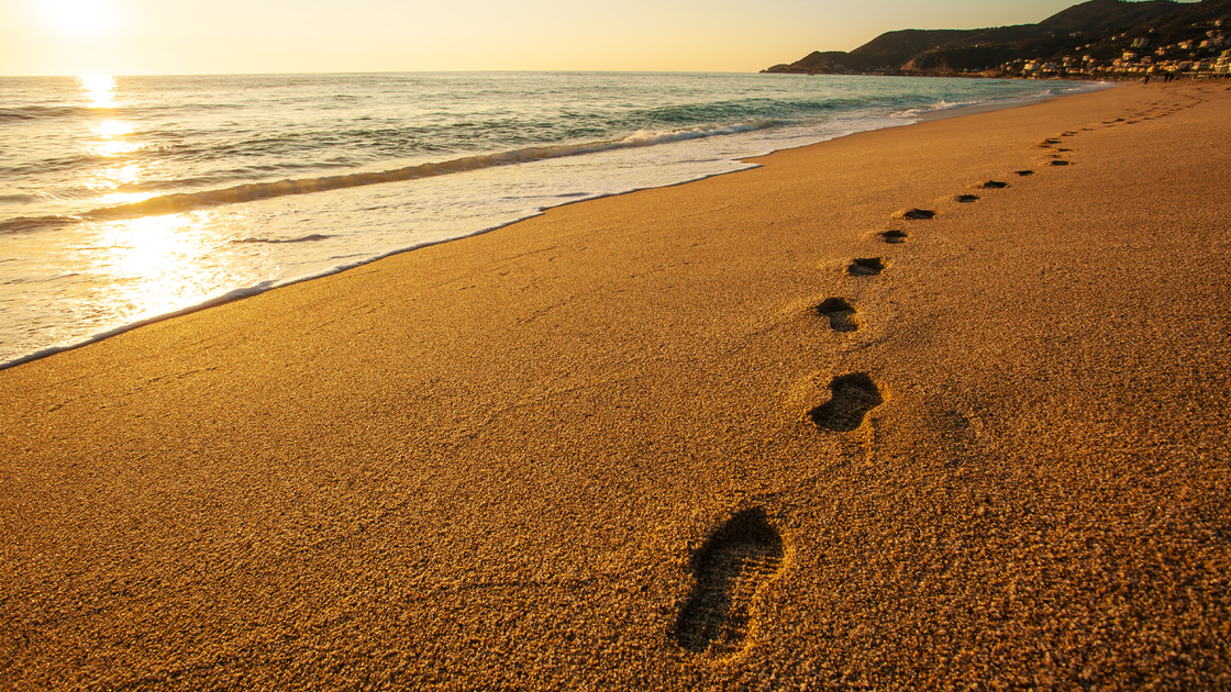 Footprints on the sandy beach