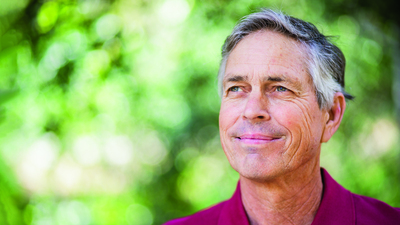 Portrait of a beautiful senior man in nature