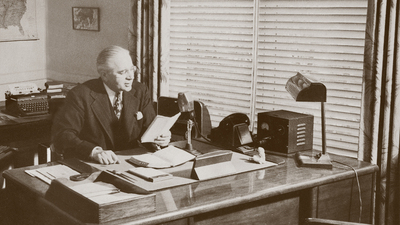 HWA recording at his desk
