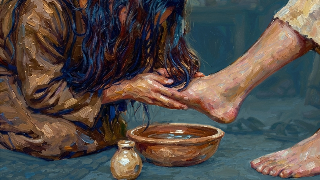 Image of a woman drying a man's feet with her hair out of humility