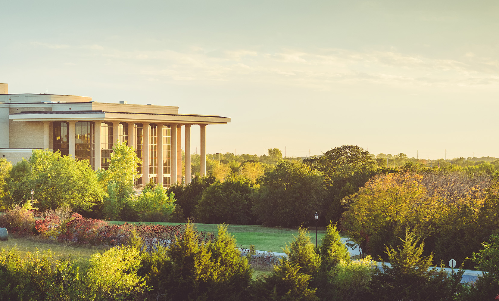 Armstrong Auditorium campus at sunset