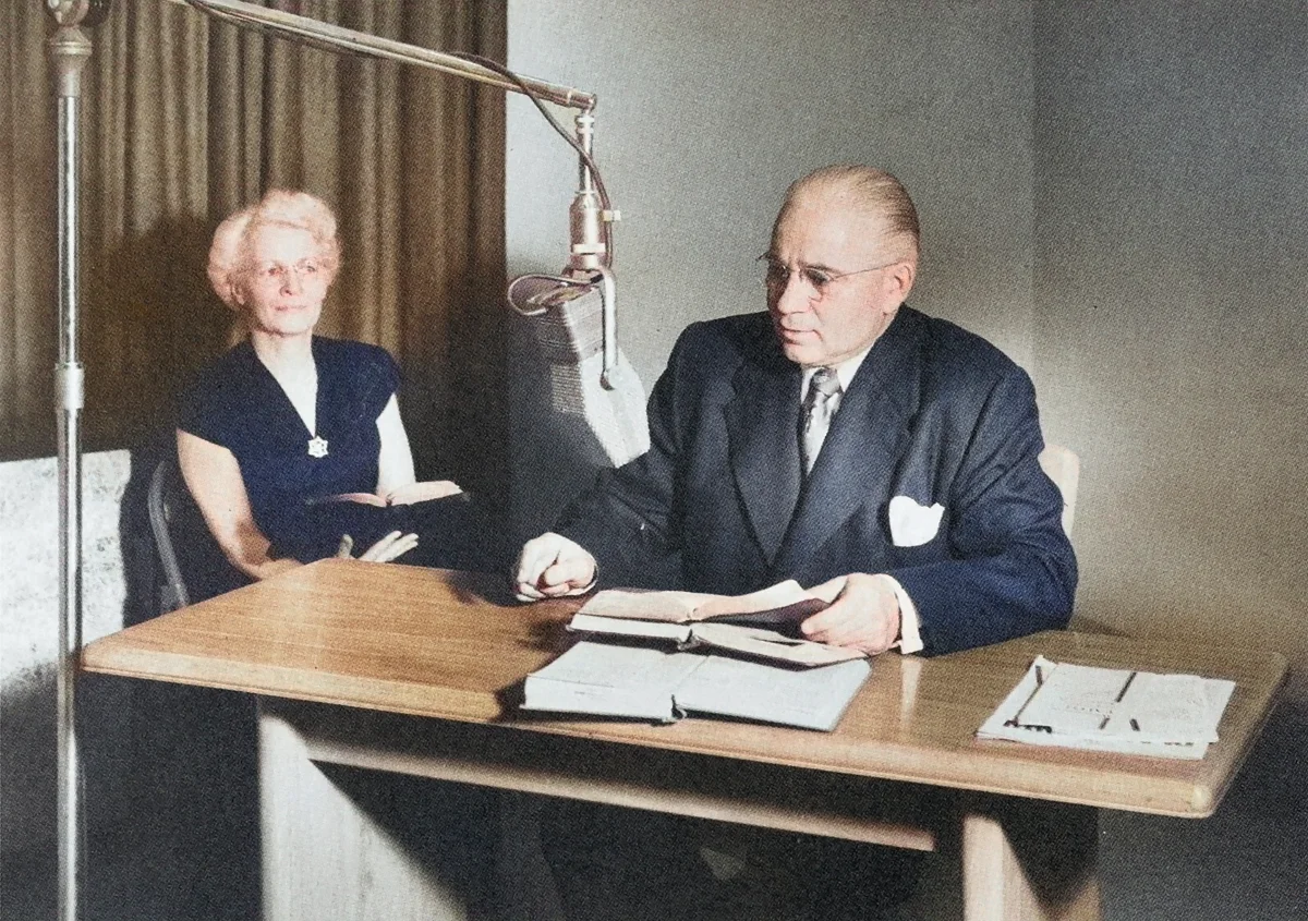 Herbert W. Armstrong delivers a World Tomorrow program as his wife Loma watches